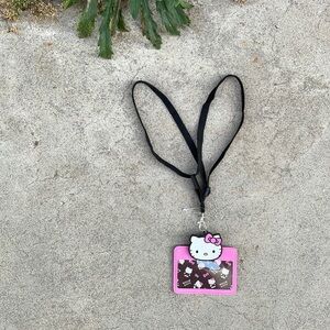 NWT. Hello Kitty Two Black Strap Lanyard ID Holder